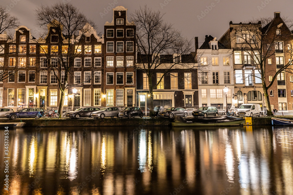 Night lights of building and channels in Amsterdan