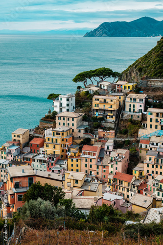 View of Riomaggiore from the top of the hill. Old village of Cinque Terre National Park in Liguria, Italy