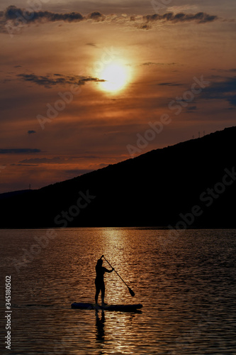 Sup boarding on sunset