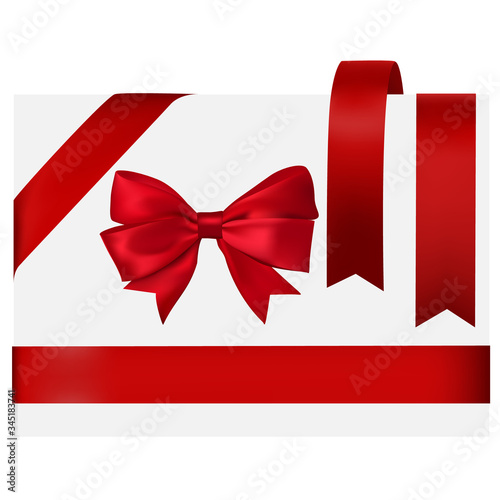 Shiny red satin ribbon on white background
