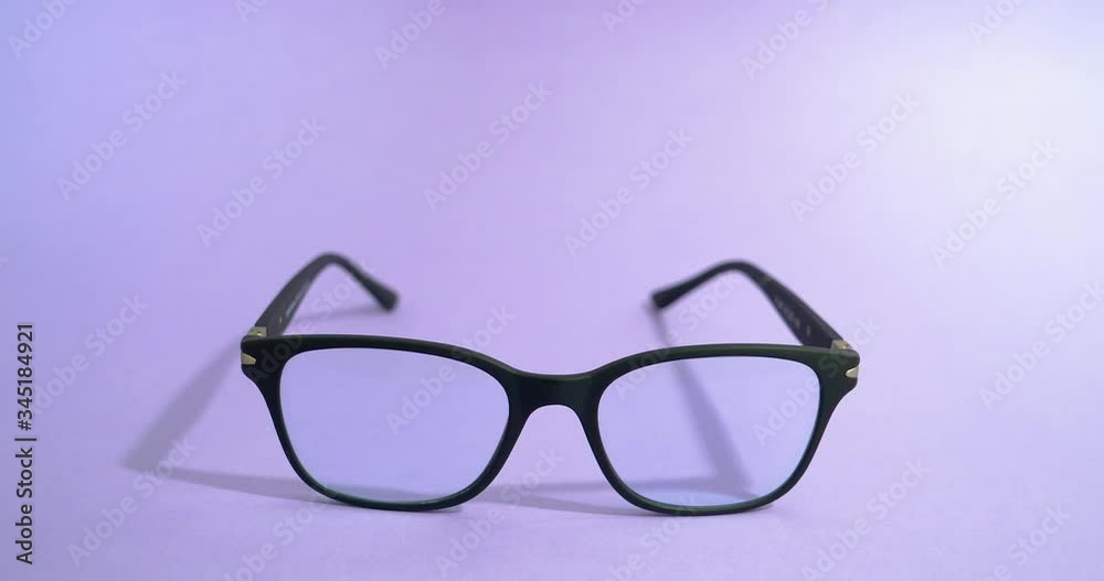 Blue light blocking glasses on the laptop. Black frame glasses for filtering blue light from the computer. Prevent Computer Vision Syndrome. Eye protection from PC screen Blue light blocking glasses on the laptop. Black frame glasses for filtering blue light from the computer. Prevent Computer Vision Syndrome. Eye protection from PC screen