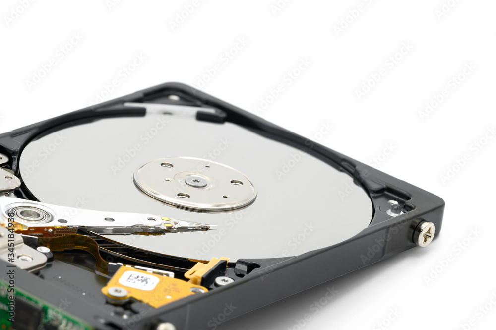 Disassambled Hard disk drive isolated on white background . Disassambled Hard disk drive isolated on white background .