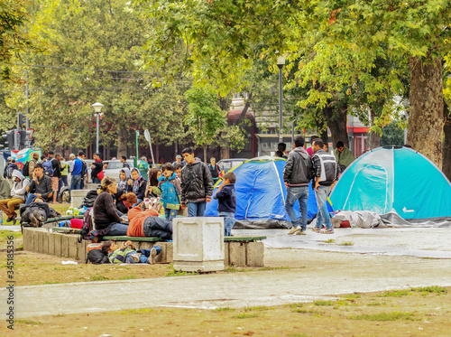 Serbia; Belgrade; August 23, 2015: Syrian Refugees and Migrants Waiting  at beautiful ambiance Park in Belgrade, Serbia.