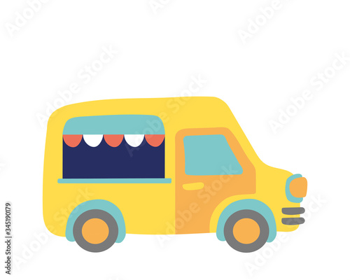 Yellow cafe on wheels. Food truck at the festival.