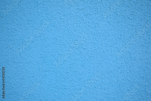 concrete wall, colored texture of plaster, texture background bright blue color