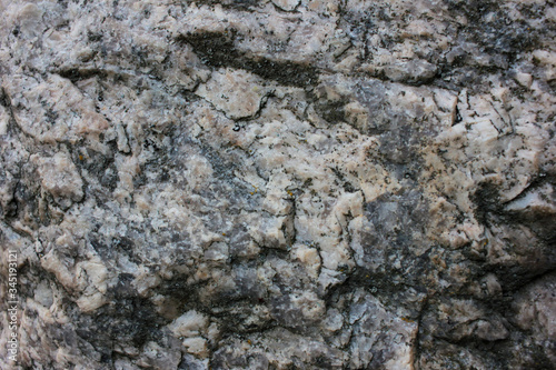 Rock texture background. Fragment of natural stone wall