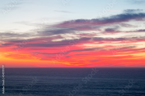 red sunset over the sea cornwall uk 