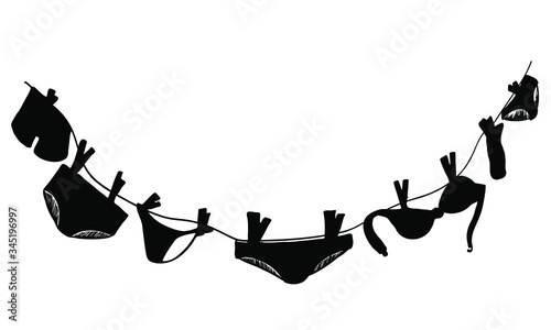 Silhouette of things that are drying on a rope. Underwear after washing in vector vintage style. Women's underpants, sconces and socks for decorating postcards and illustrations. Suitable for printed.