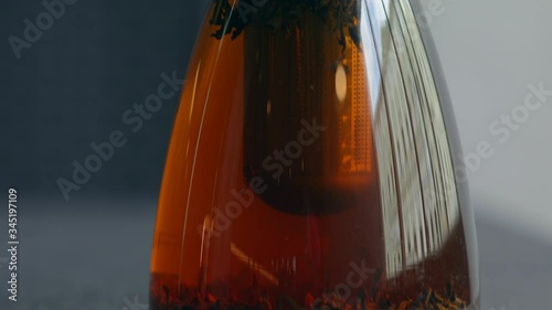 Black tea
brewed tea in a glass teapot
teas in a clear liquid on a bar counter in a restaurant
shot 4.6k photo