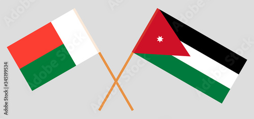 Crossed flags of Jordan and Madagascar