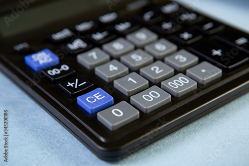 close up calculator key pad focus on one point and shallow depth of field