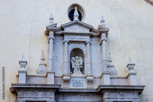 sculpture spanish old church facade, background with architectural elements photo