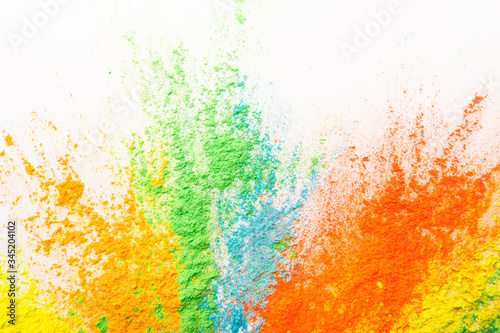 Beautiful multicolor powder explosion on white background