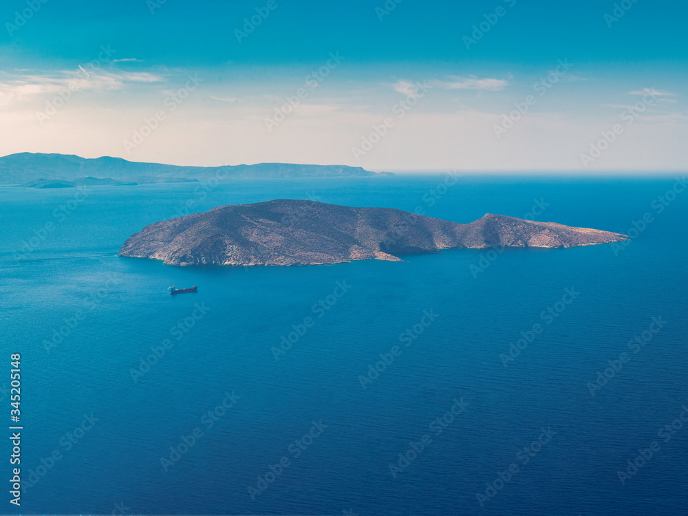 Island and boat near Crete, Greece