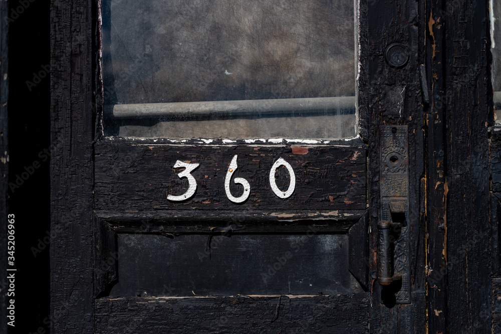 Number 360 On Old Black Door 