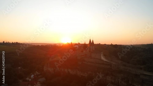 Wallpaper Mural Sunset behind Kamianets Podilsyi Castle in Ukraine Torontodigital.ca