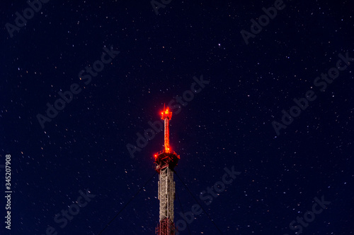 radio tower on night starry sky background