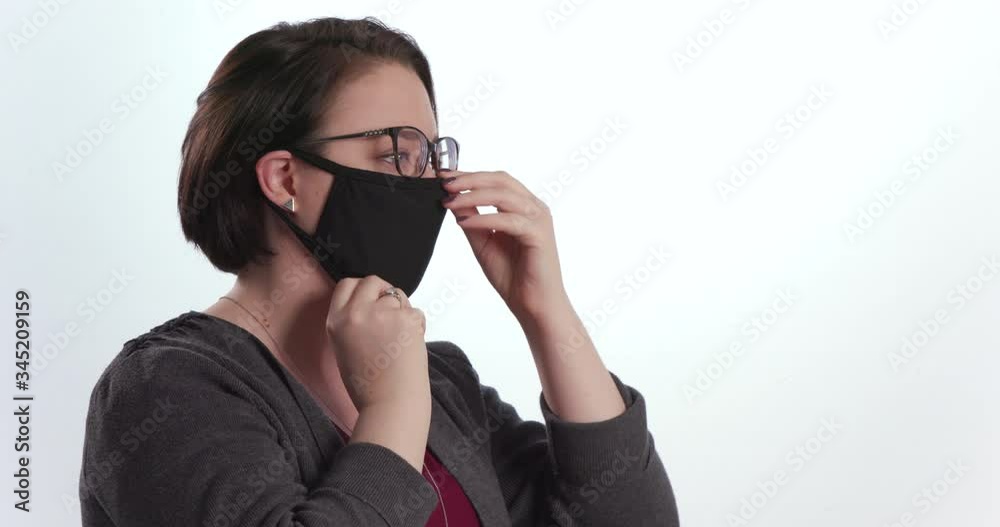Female Wearing Homemade Protective Face Mask PPE on White Background Female Wearing Homemade Protective Face Mask PPE on White Background
