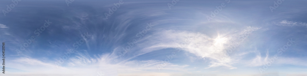 blue sky with beautiful fluffy cumulus clouds. Seamless hdri panorama 360 degrees angle view without ground for use in 3d graphics or game development as sky dome or edit drone shot