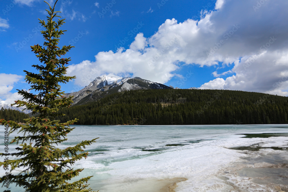 Two Jack Lake melting in spring in Banff National Park, Canada