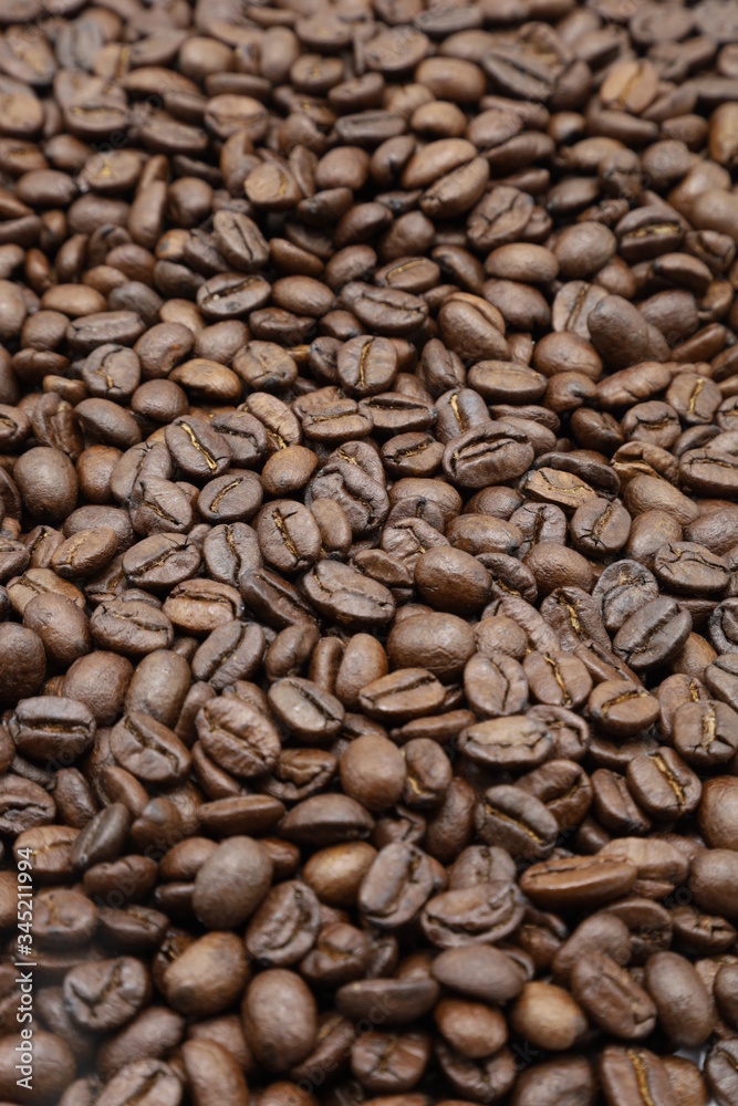 roasted coffee beans with background
roasted coffee beans with background