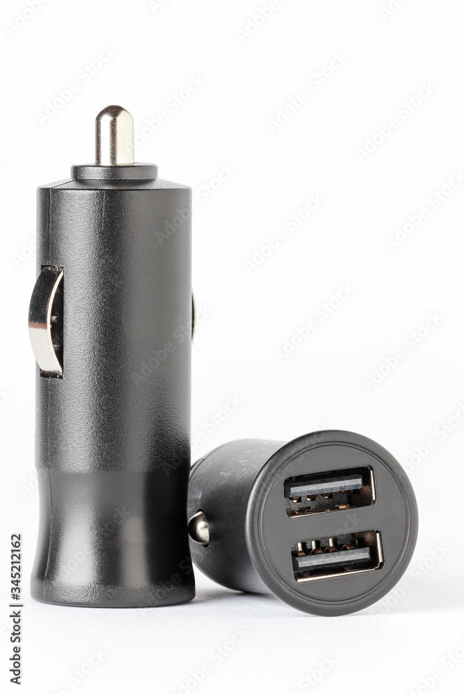 two usb socket car chargers isolated on white background two usb socket car chargers isolated on white background