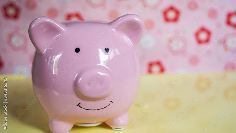 piggy bank isolate in flower background, pink sakura background piggy bank isolate in flower background, pink sakura background
