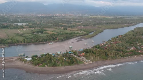 Peninsula Prancak Perancak on a background of mountains and jungle in sunny weather photo