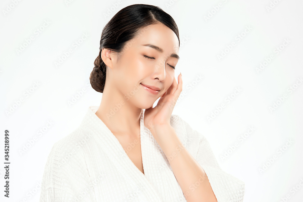 Beautiful Young Asian Woman with Clean Fresh Skin. Face care, Facial treatment, Cosmetology, beauty and healthy skin and cosmetic concept, woman beauty skin isolated on white background Beautiful Young Asian Woman with Clean Fresh Skin. Face care, Facial treatment, Cosmetology, beauty and healthy skin and cosmetic concept, woman beauty skin isolated on white background