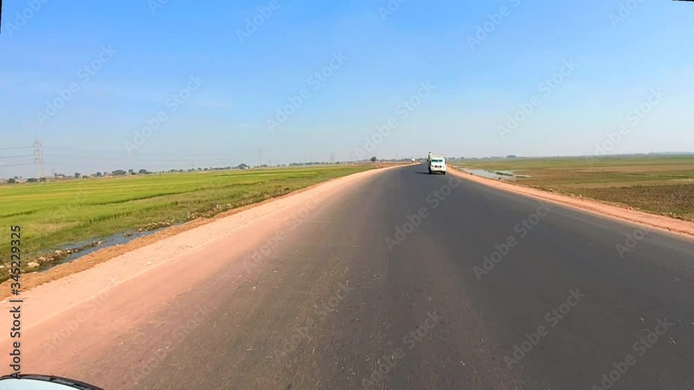 tarmac road clip with amazing blue sky taken form fast moving vehicle tarmac road clip with amazing blue sky taken form fast moving vehicle