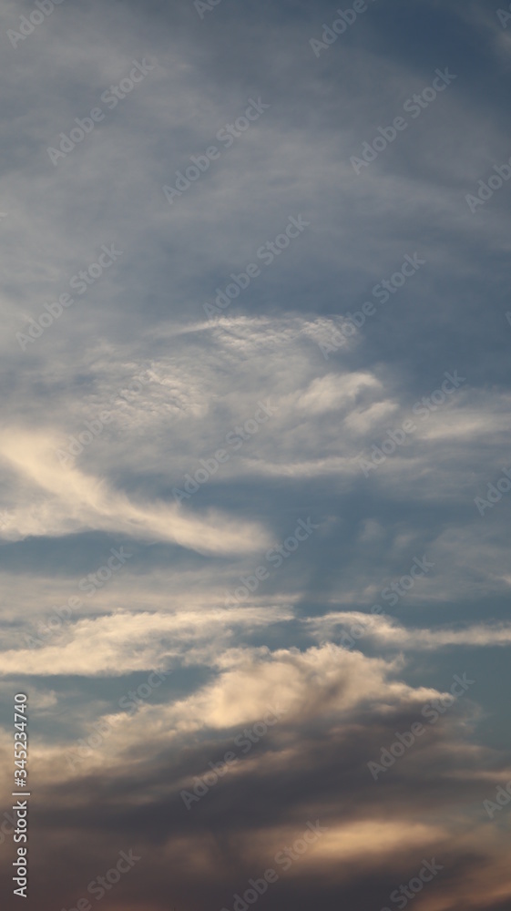 Abstract, Clouds looking like the head of two large snakes opening their mouths.