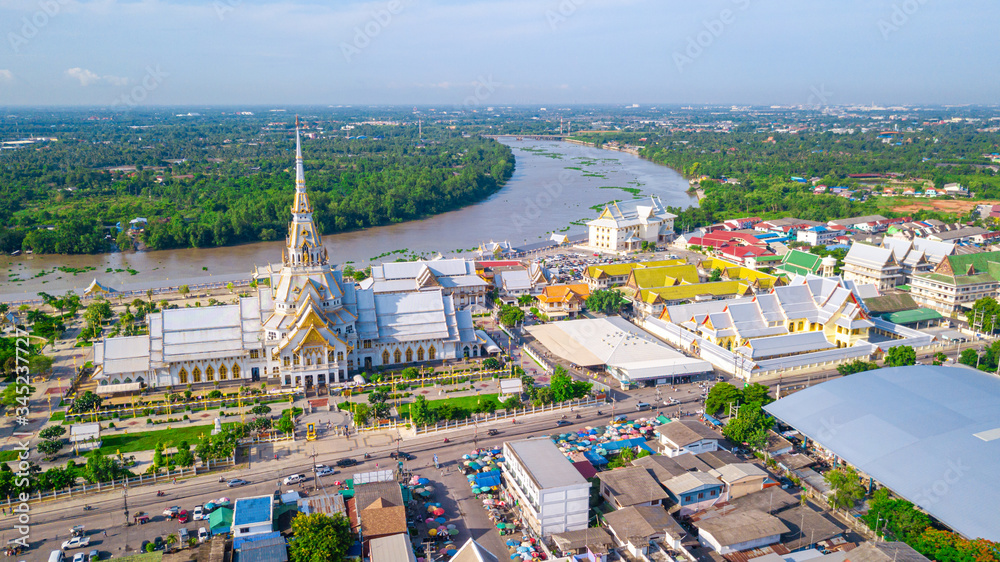 Fototapeta premium Aerial view of great grand architecture of Wat Sothon Wararam Worawihan located near Bang Pakong river in Chachoengsao province, Thailand.