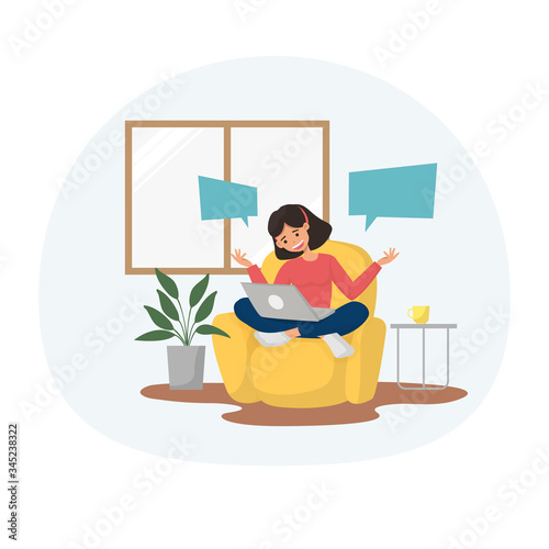 Work from home or quarantine concept. A woman sit on yellow sofa chat or video conference with team at home.