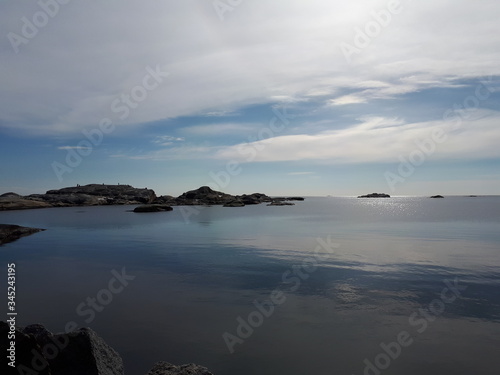 Landscape with a rocky coast over the blue sea - Verdens Ende 