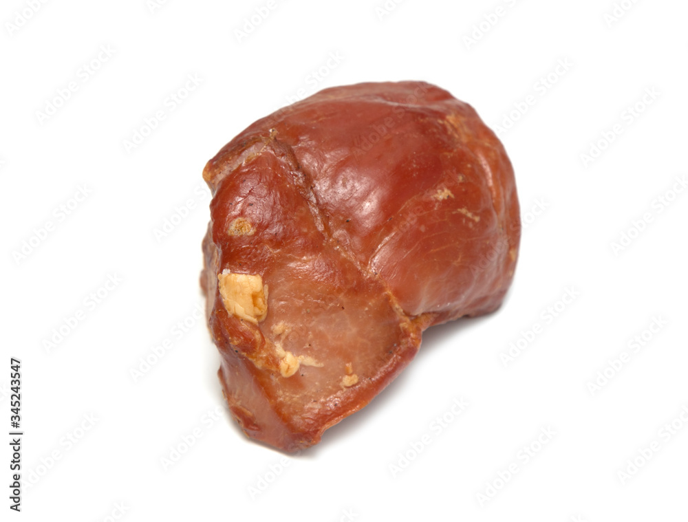 A piece of baked beef isolated on a white background. A piece of baked beef isolated on a white background.