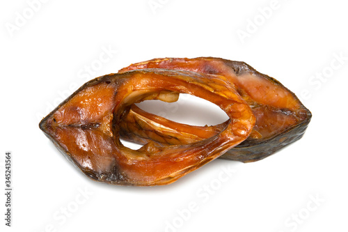 Smoked fish steak isolated on a white background.