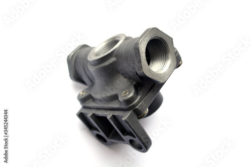 Quick release valve of the truck's pneumatic brake system on a white background. Spare parts.