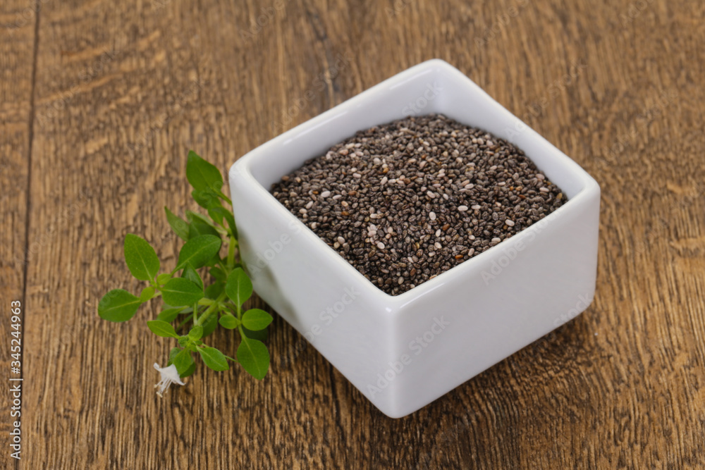 Dietary Chia seeds in the bowl Dietary Chia seeds in the bowl