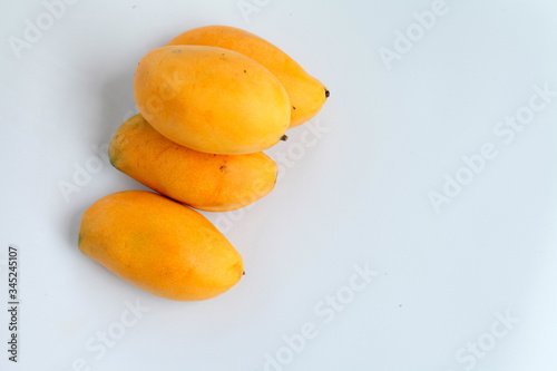 Mangoes on a white background
