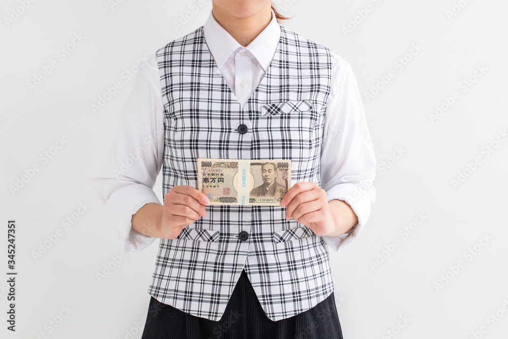 銀行員の女性が100万円を持っている 給付金 持続か給付金 money 笑顔 銀行員の女性が100万円を持っている 給付金 持続か給付金 money 笑顔