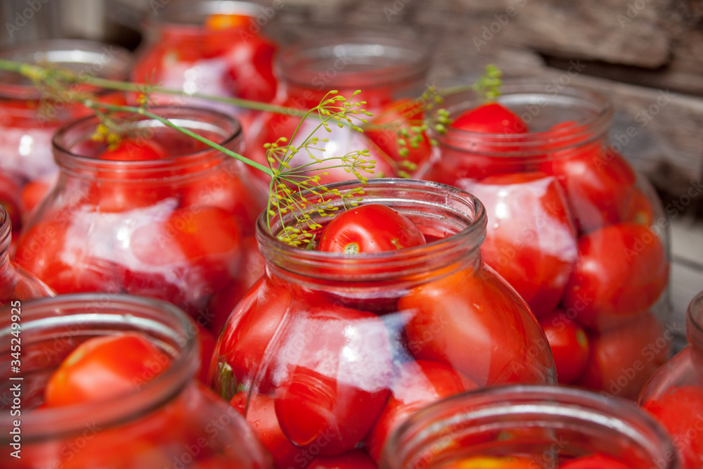 Pickling (canning) the tomatoes. Pickling (canning) the tomatoes.