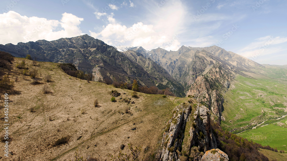 Obraz premium Chegem, Paragram, Kabardino-Balkar Republic. Chegem gorge. Panorama of mountains and gorges on a clear Sunny day.