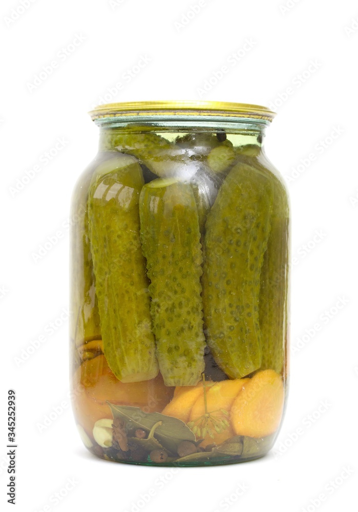 Glass jar, pickles with cucumbers, white background. Glass jar, pickles with cucumbers, white background.