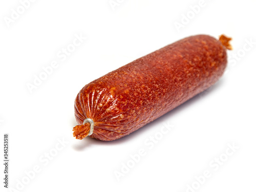 Smoked sausage on a white isolated background. Concept of food, meat dish.