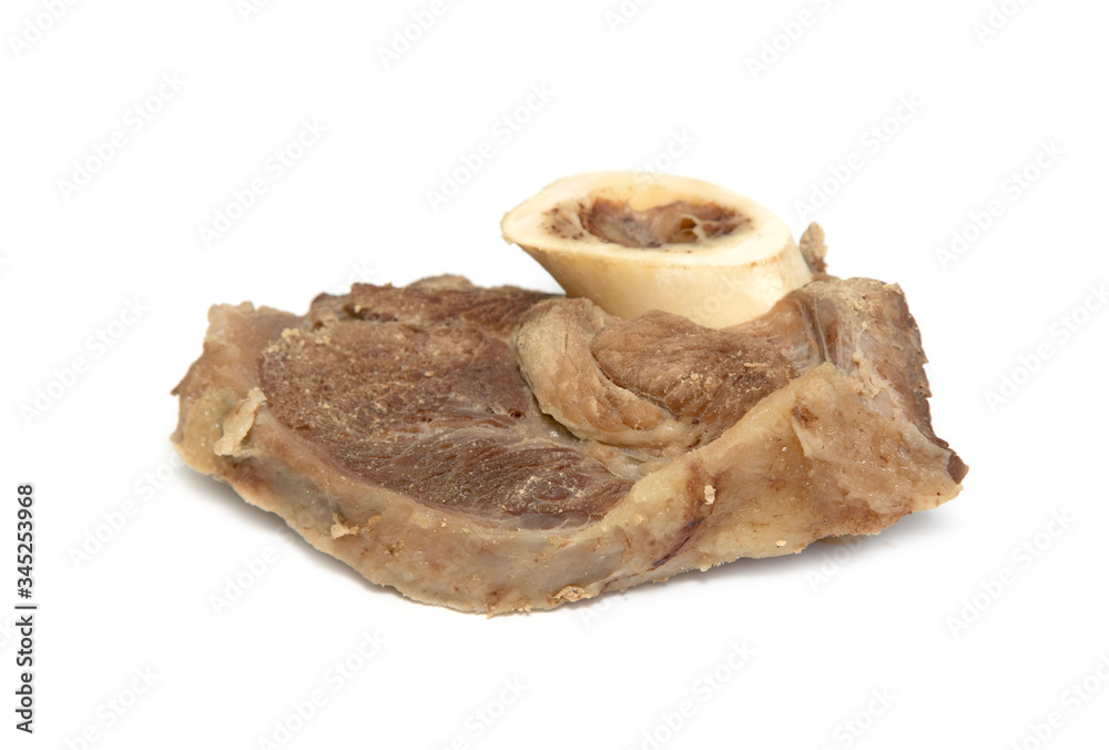 Beef ribs cooked on a white background. Beef ribs cooked on a white background.