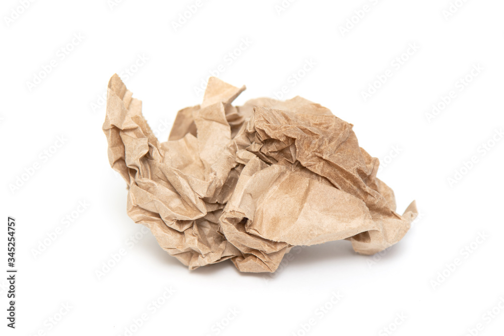 A crumpled paper bag with greasy spots highlighted on a white background. A crumpled paper bag with greasy spots highlighted on a white background.