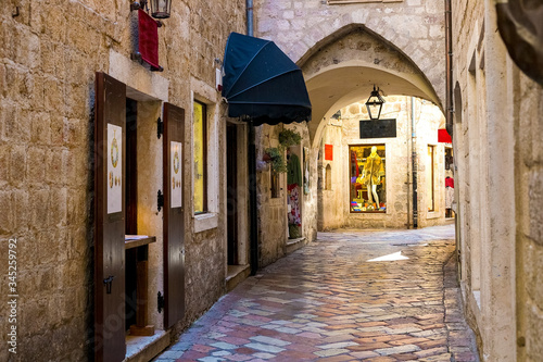 The narrow street of the authentic old town of Kotor, Montenegro. © Natallia