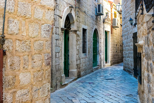 Fototapeta Naklejka Na Ścianę i Meble -  The narrow street of the authentic old town of Kotor, Montenegro.