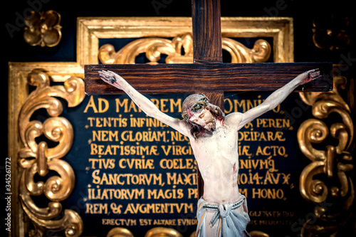 Detail view of the crucifixion of Jesus at the 15th century Catholic pilgrimage church Mariä Heimsuchung in Zell am Pettenfirst, Austria, carved by Thomas Schwanthaler in 1668 photo