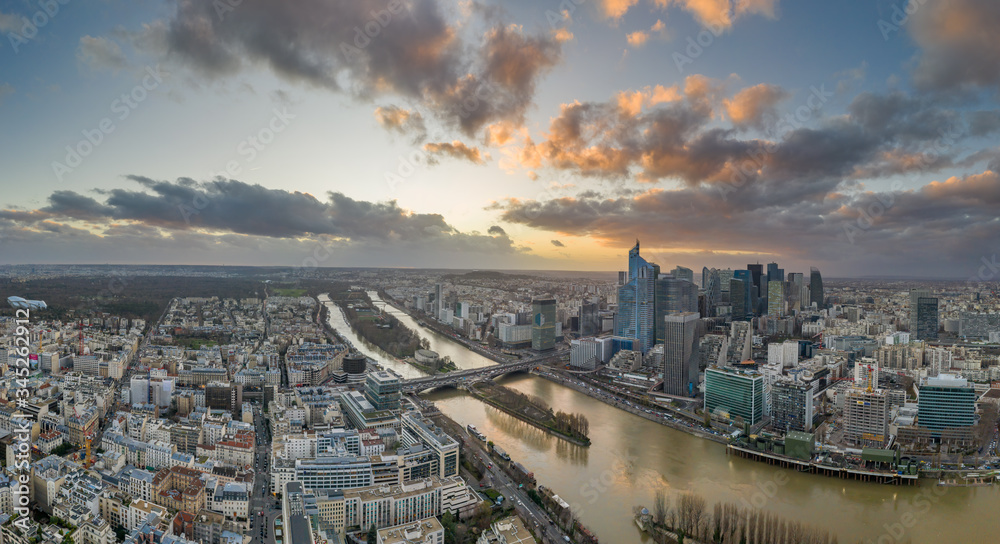 Aerial drone shot of Neuilly la defense skyscraper complex during sunset time in Paris in Paris
